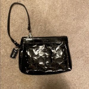 Black patented leather wristlet